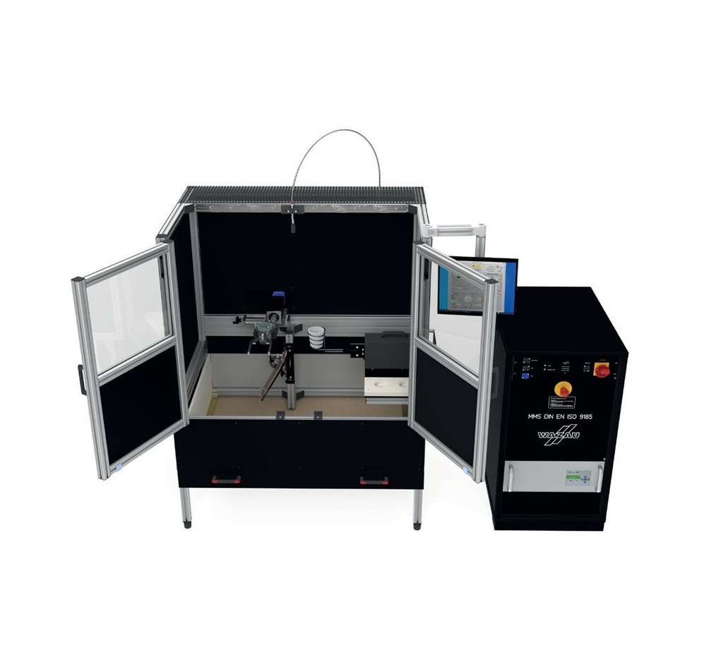 Wazau MMS molten metal splash tester with open enclosure doors and control cabinet